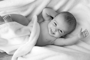Why Is My Baby Squirming While Breastfeeding? Reasons & Solutions